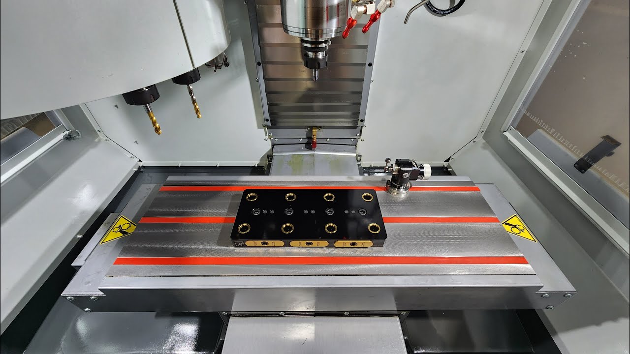 Redesigned (2024) Haas Mini Mill cutting a pallet for 5th Axis Rocklock base