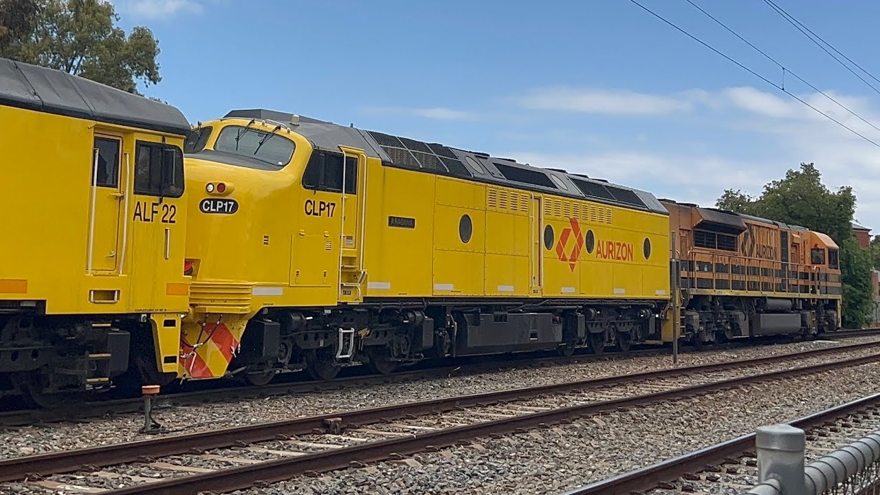 Aurizon grainy: 2182s with GWA010, CLP17 (Canary liv), ALF22, CLP16 & ALF18