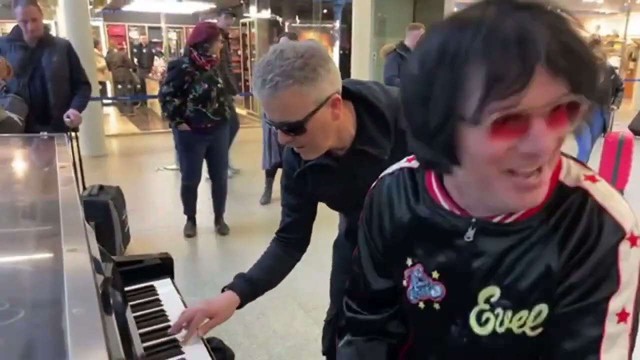 COMMUTERS STUNNED WATCHING AWESOME PIANO DUO CONQUER THE STATION PIANO