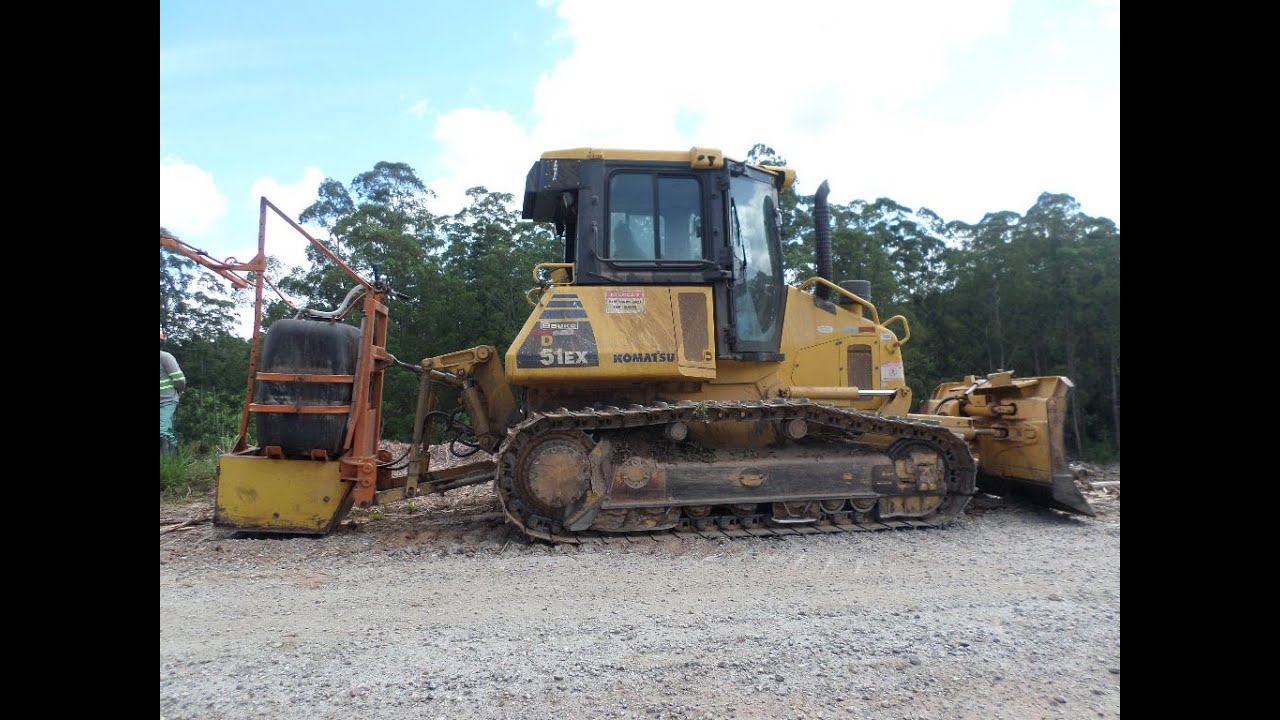 Steep terrain chemical spray  with Komatsu  dozer