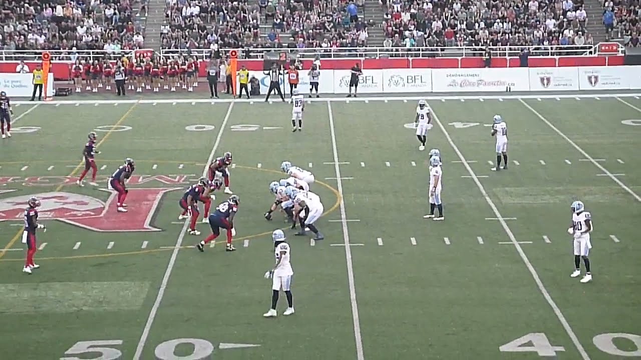 Toronto Argonauts QB Nick Arbuckle throws a 21-yard pass to Dejon Brissett vs. Montreal Alouettes