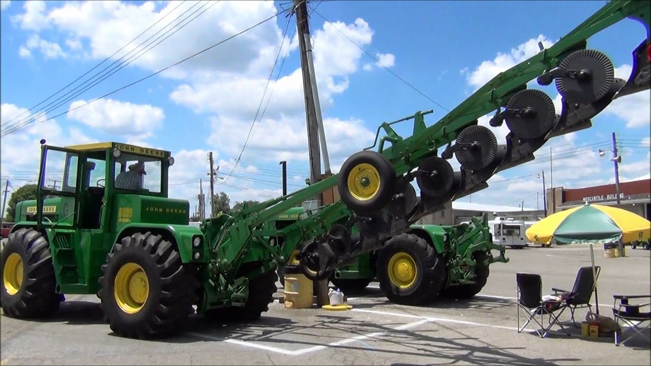 8020 John Deere with 8 Bottom Plow