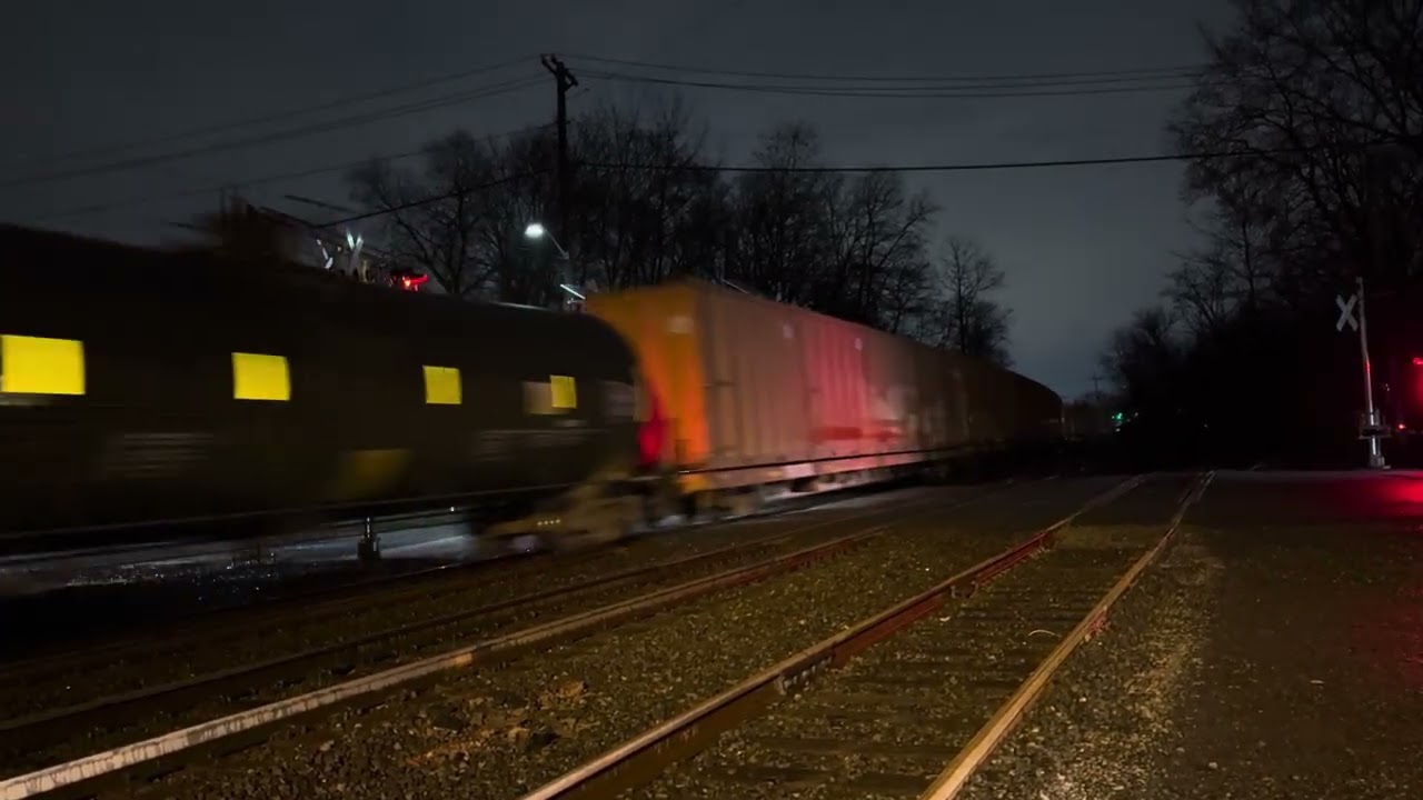 CSX 3128 ES44AH leads CSX M409 at Piscataway 