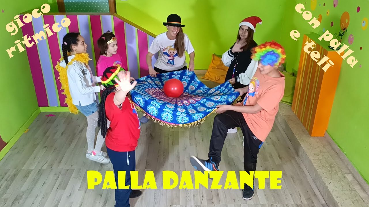 GIOCO RITMICO CON TELI E PALLE  - 