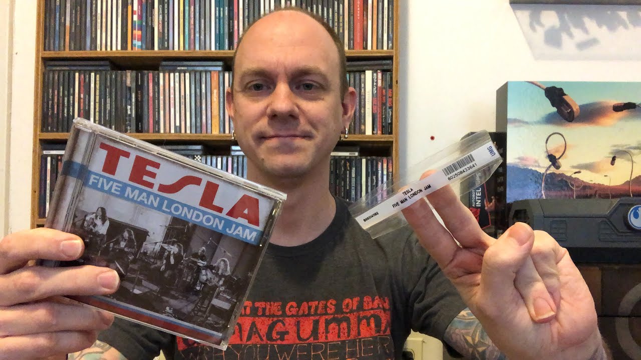 How To Best Open A CD (and remove that annoying sticker)