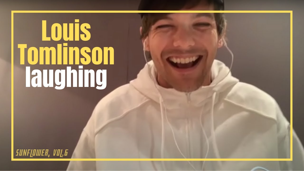 Louis Tomlinson laughing