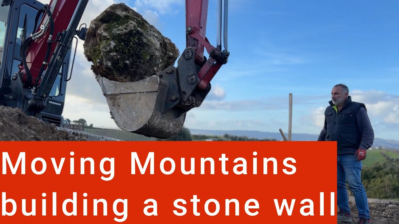 Heavy  stones, steady hands, Tractor-Built Wall in the Field