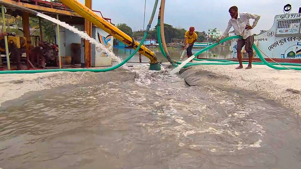 Sand Mining in Action: Powerful Dredging Pump at Work | Sand Flow Chronicle