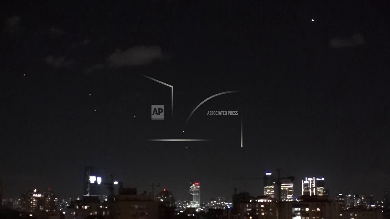 Israeli air defenses fire on Iranian missiles targeting Tel Aviv