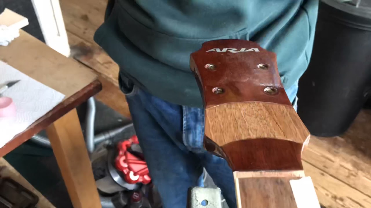 Fixing a broken headstock on an Aria acoustic guitar