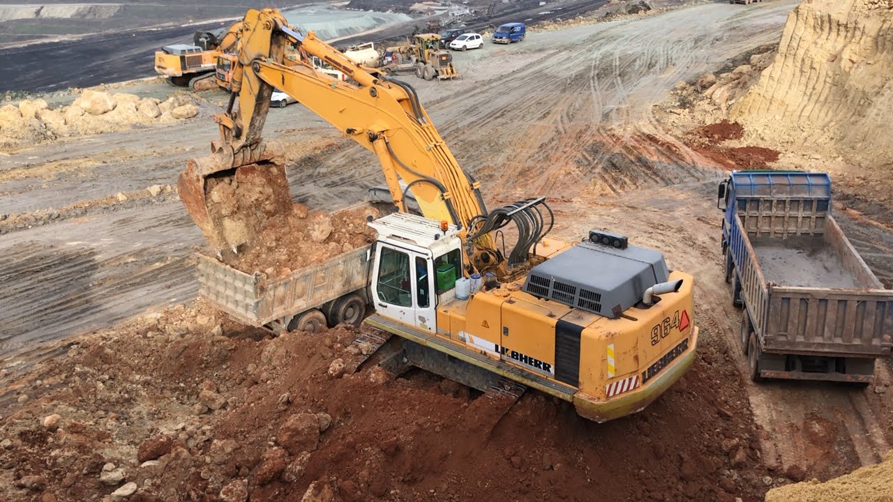 Liebherr 964 Excavator Loading Mercedes And MAN Trucks