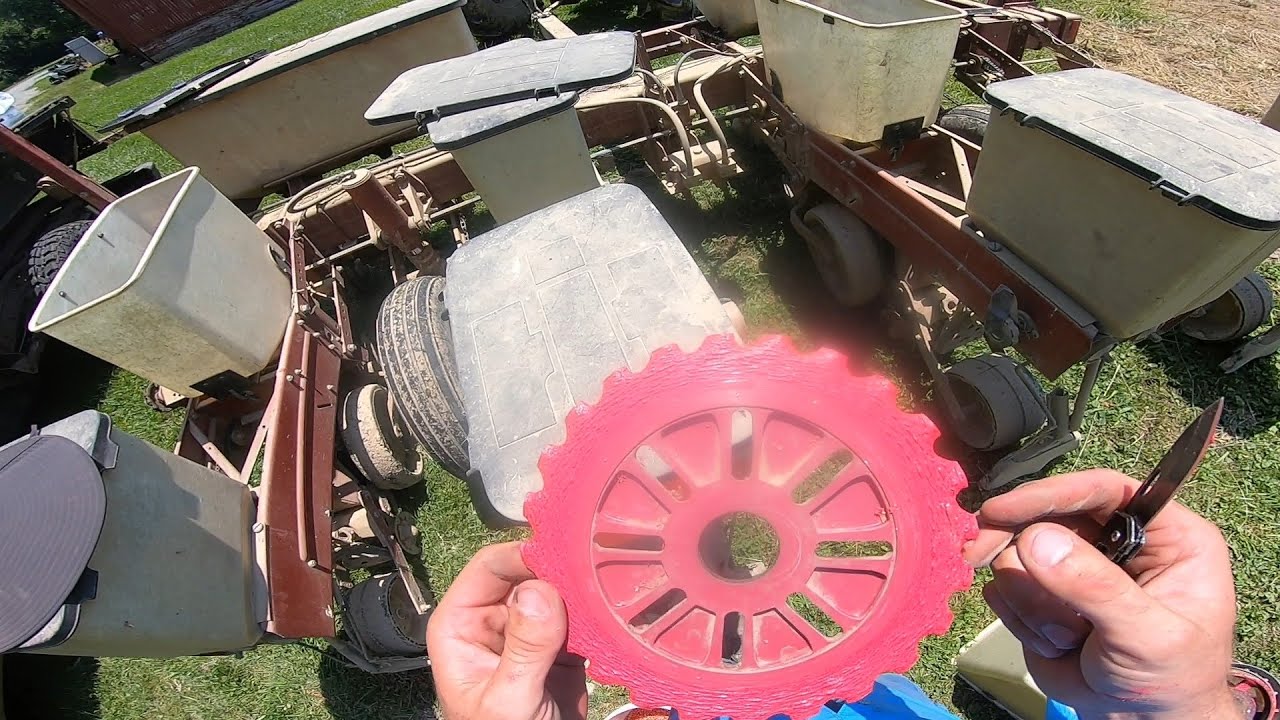 Scraping Seed Treatment Off Planter Plates