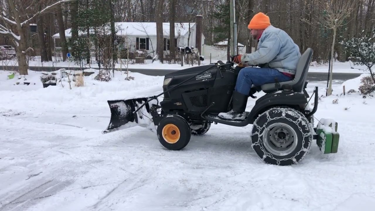 Garden Tractor Plowing Snow with Round Edge