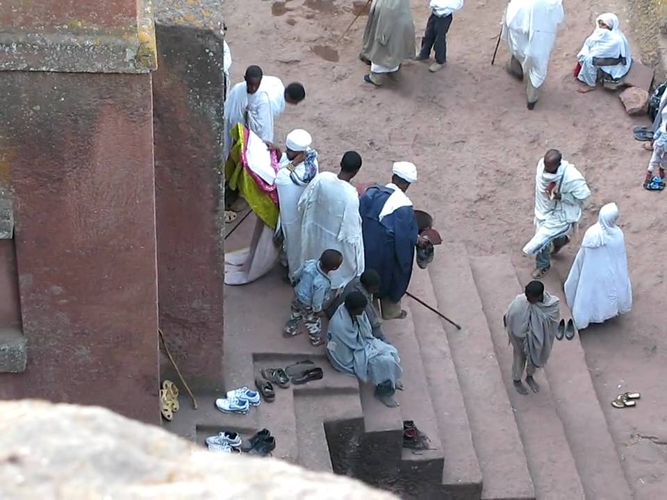 Priest and Early-Morning Worshippers (Lalibela, Ethiopia)
