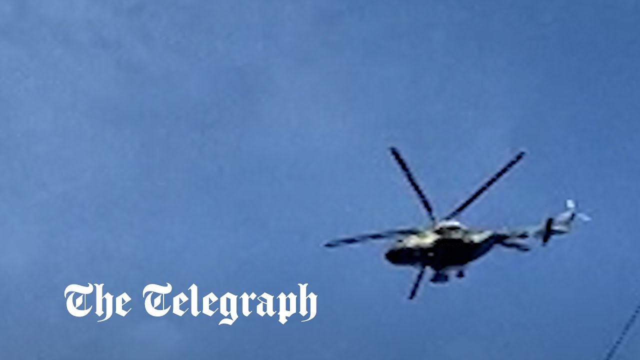 Russian helicopters fly close to Kyiv after an airport attack