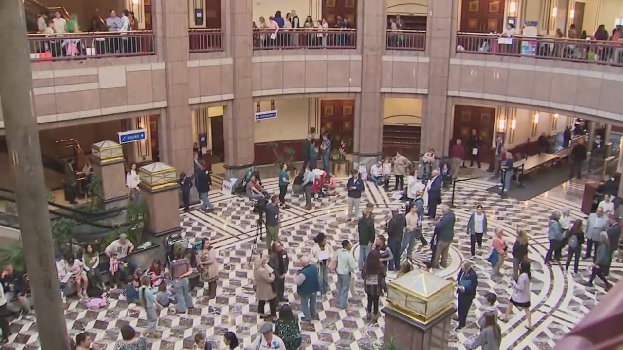 Connecticut residents converge on capitol over pair of contentious issues