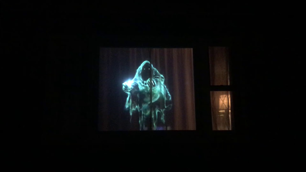 scary ghost apparition in window, cool Halloween effect