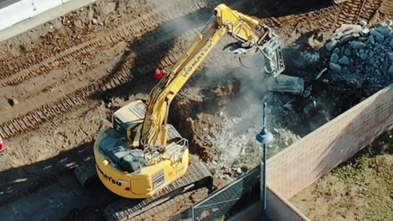 Bucket Attachment Close up scooping dirt and rocks hydraulic excavator #postmymachine