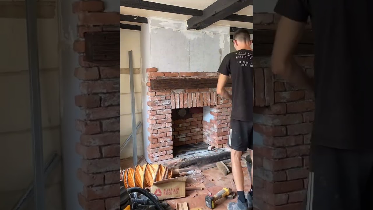 Chimney breast construction in Sunningdale with wood stove installation and reclaimed brick slips