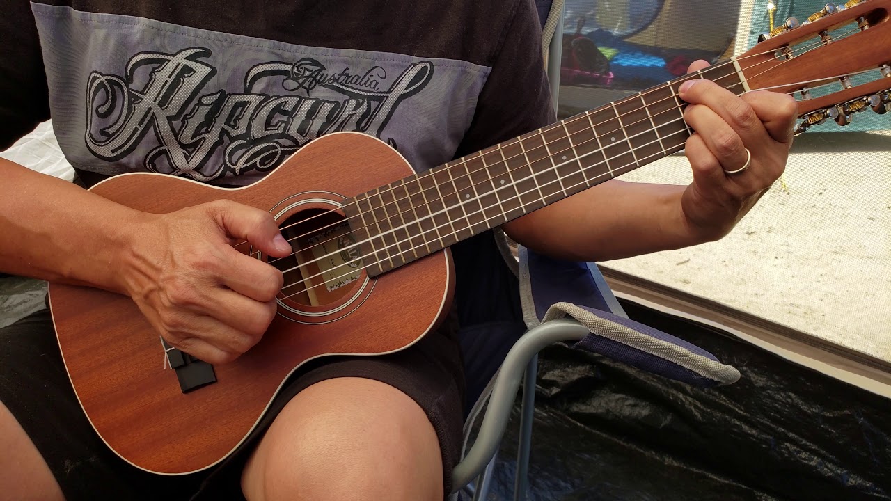 Blues Guitarist Improvising on Guitarlele
