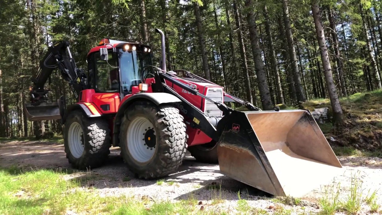 Köp traktorgrävare Huddig 1260 med redskap på klaravik.se