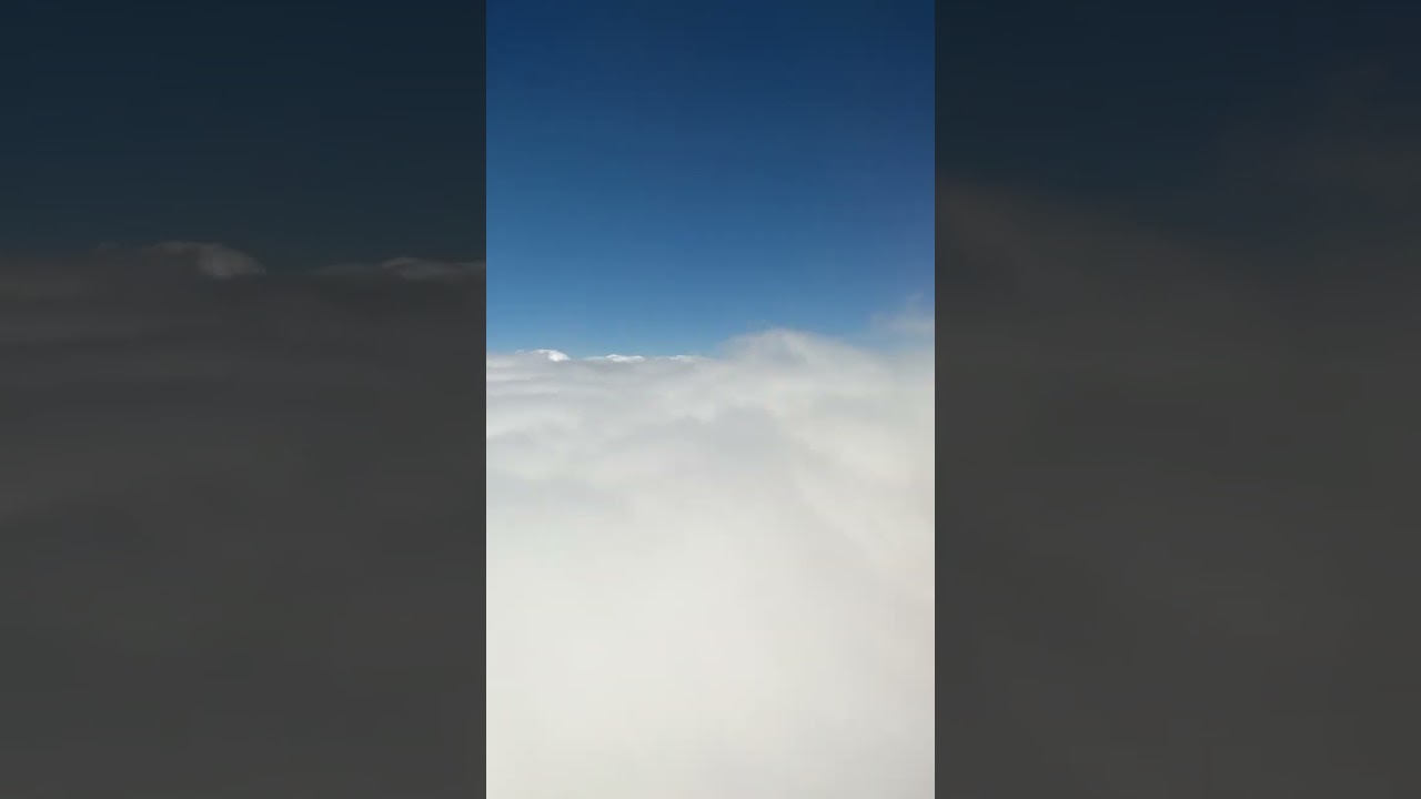 Passing Through Clouds: Airplane’s Journey in the Sky #riyadhtojeddah #airline #aviation #sky