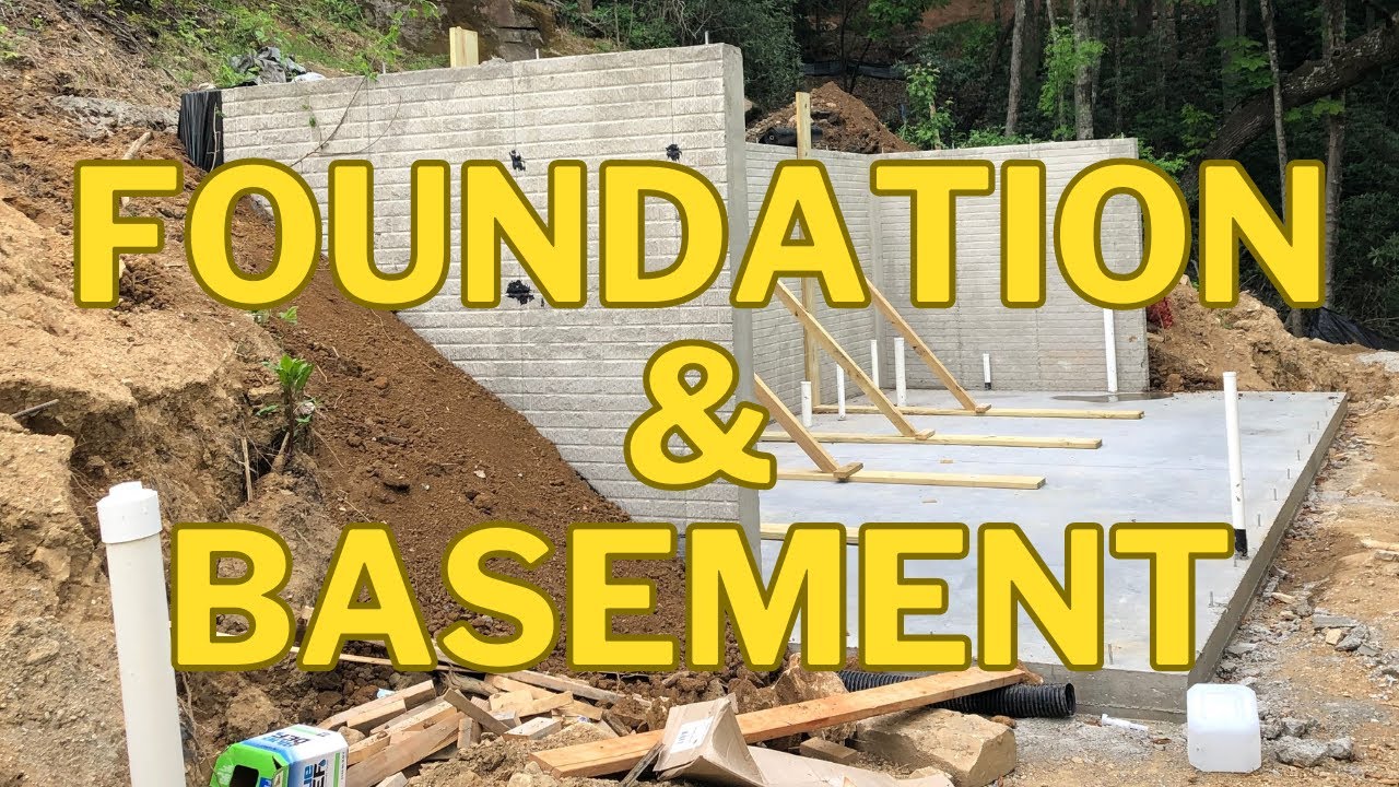 Building a log cabin on poured walk out basement
