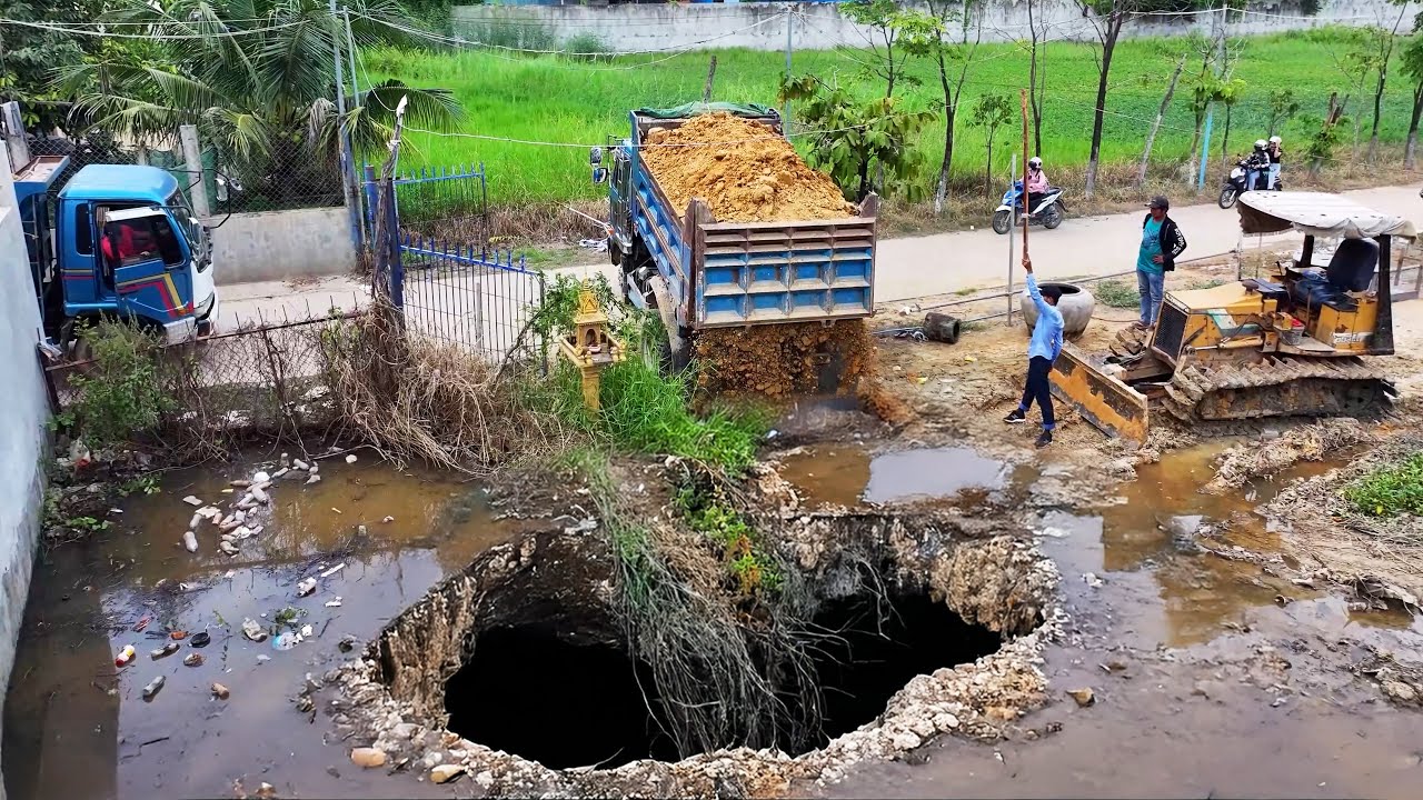 This small project looks interesting. Build a new road next to the school using a small bulldozer.