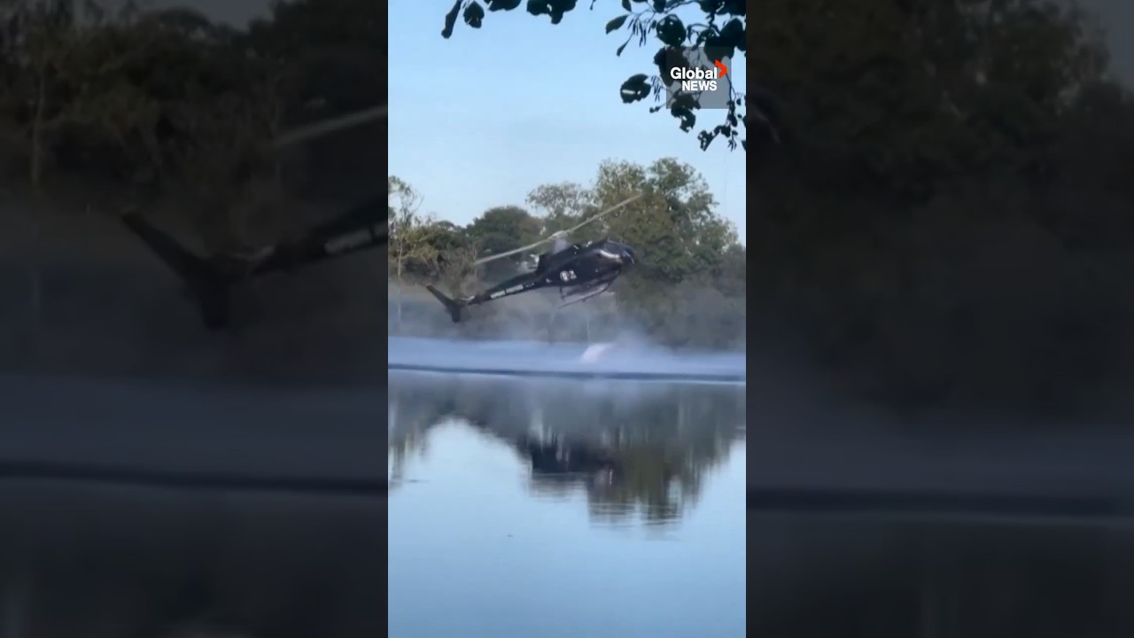 Helicopter crashes into pond while scooping water for wildfire