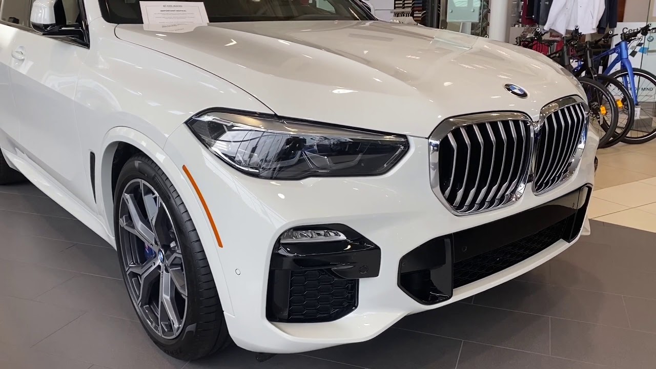 2020 BMW X5 40i Msport Package. Alpine white with Coffee Interior