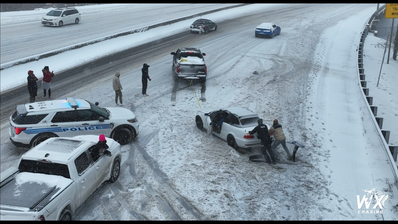 Winter Storm Chaos: Cars Sliding on icy roads and bridges in Charlotte North Carolina
