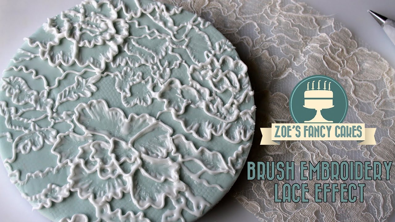 Royal icing lace effect brush embroidery on a cake board tutorial