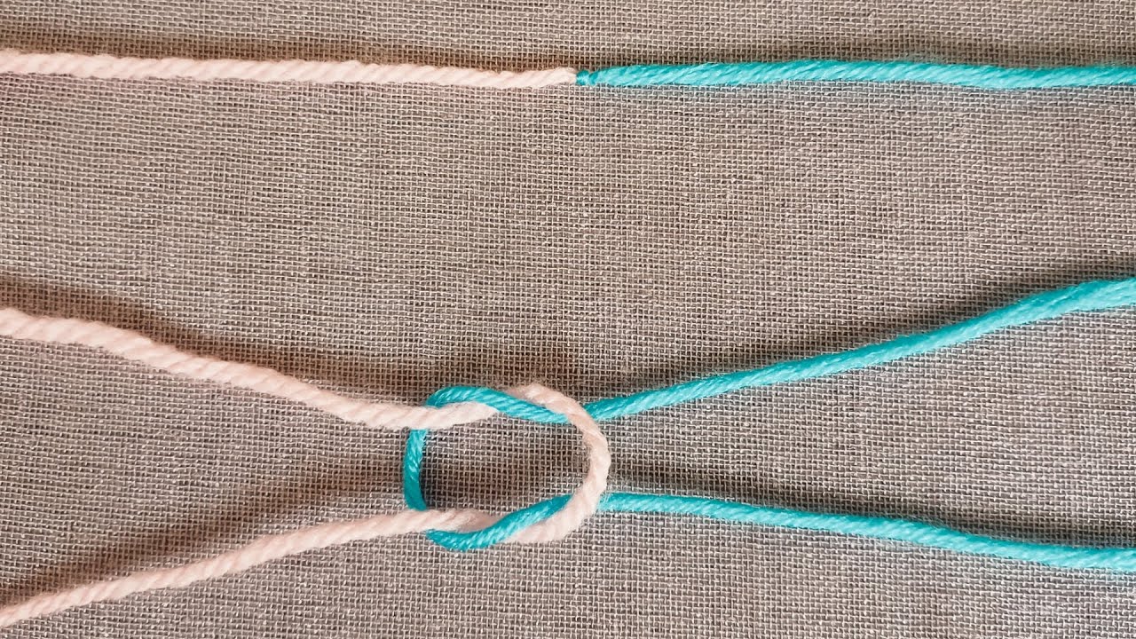 “The surgeon’s knot: strong and invisible for wool work.”