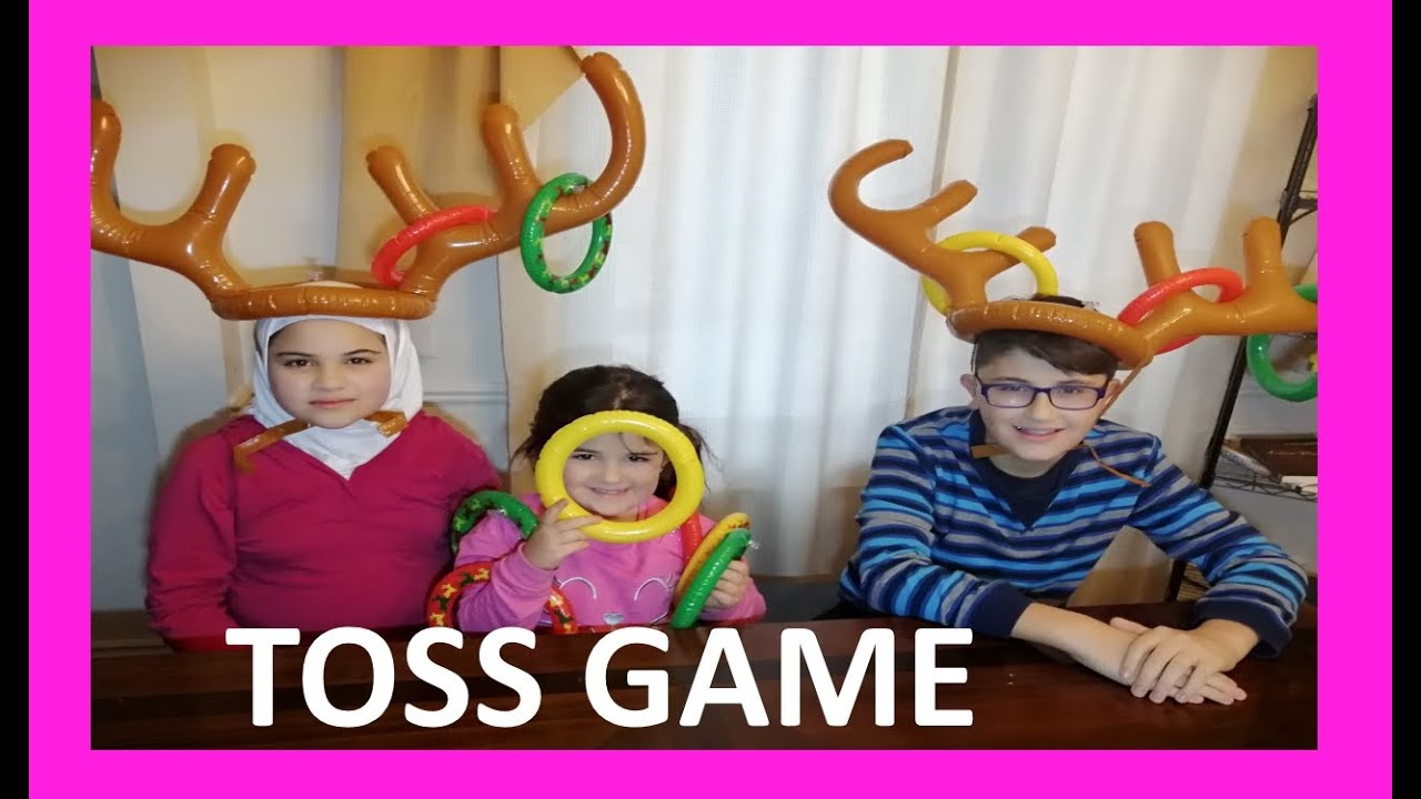TRYING THE REINDEER TOSS GAME WITH LAYLA!