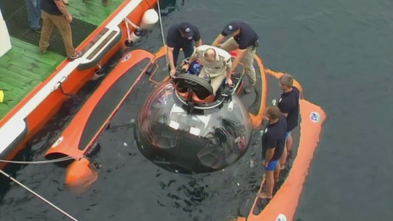 Vladimir Putin dives into the Black Sea in an underwater submersible