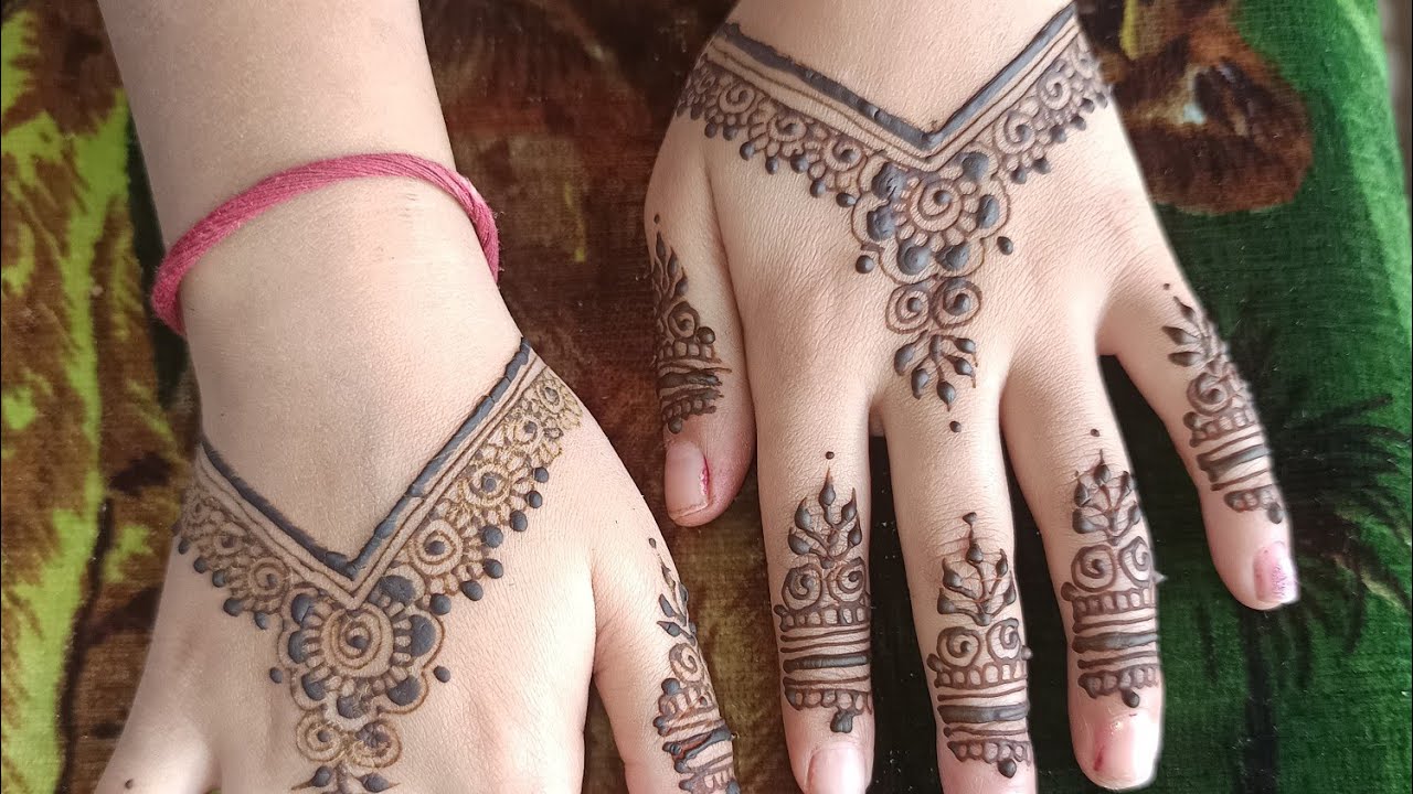 Back hand mehandi design for small girl @Suchitrasmehandiart 