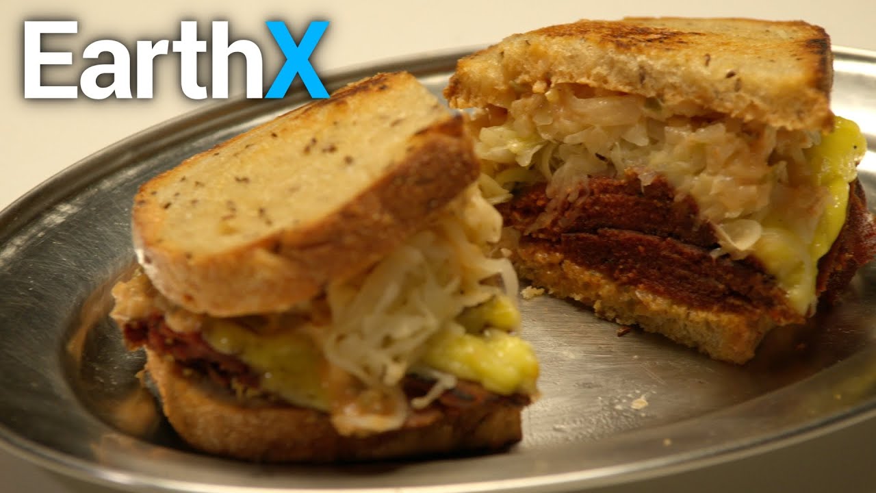 Mena Massoud and Lilly Singh Try Vegan Reubens | Evolving Vegan | EarthX
