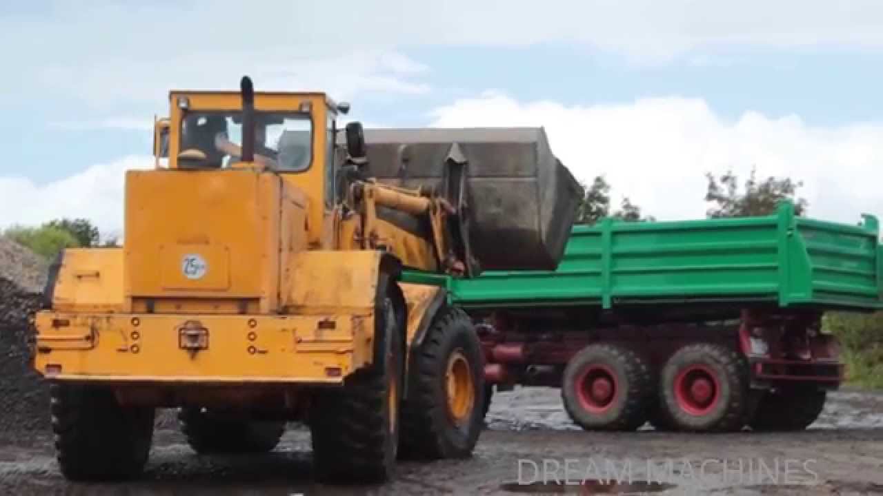 Massive KAELBLE SL20 made in Germany loading MAGIRUS DEUTZ dump truck with gravel in open pit