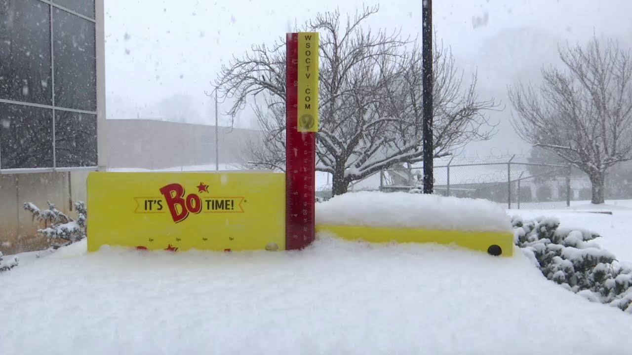 SNOWJANGLES - Snow in Charlotte stacks up outside WSOC-TV Studios