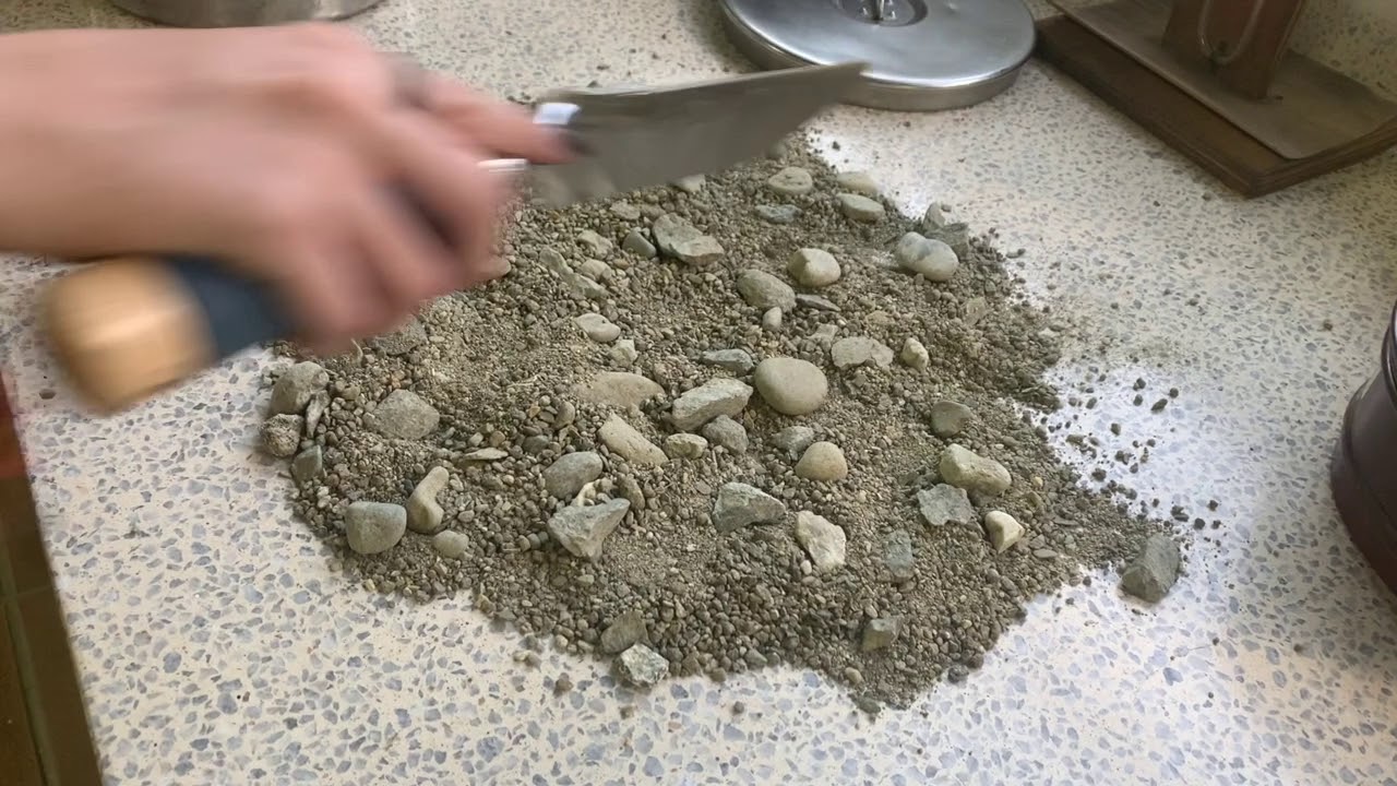 Granulometría, lavado y tamizado de una muestra de suelo