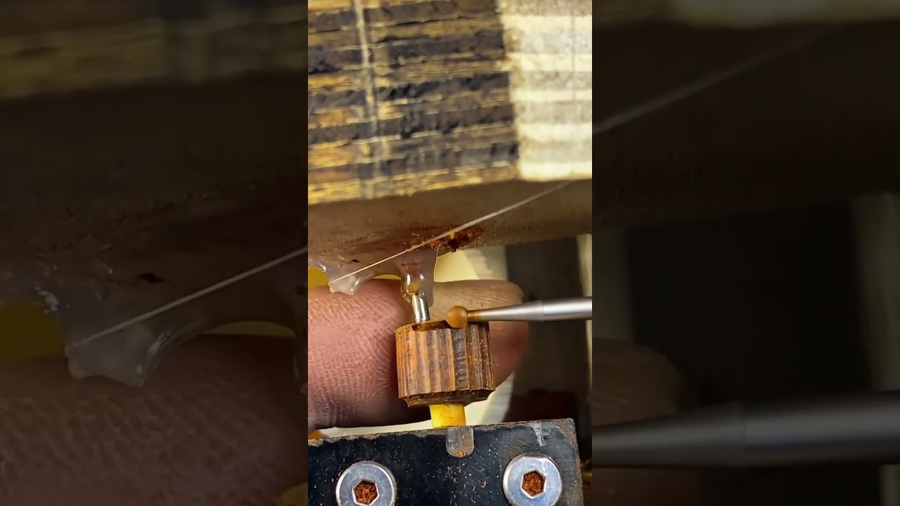Polishing the surface of a rotating metal part and the motor using a lathe to make it smooth