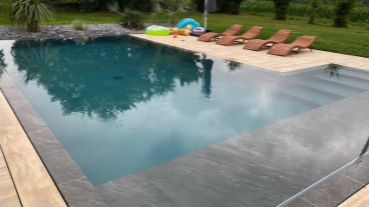 Spegelpool med ISI-MIROIR - Montera svetsliner i overflow-rännorna.