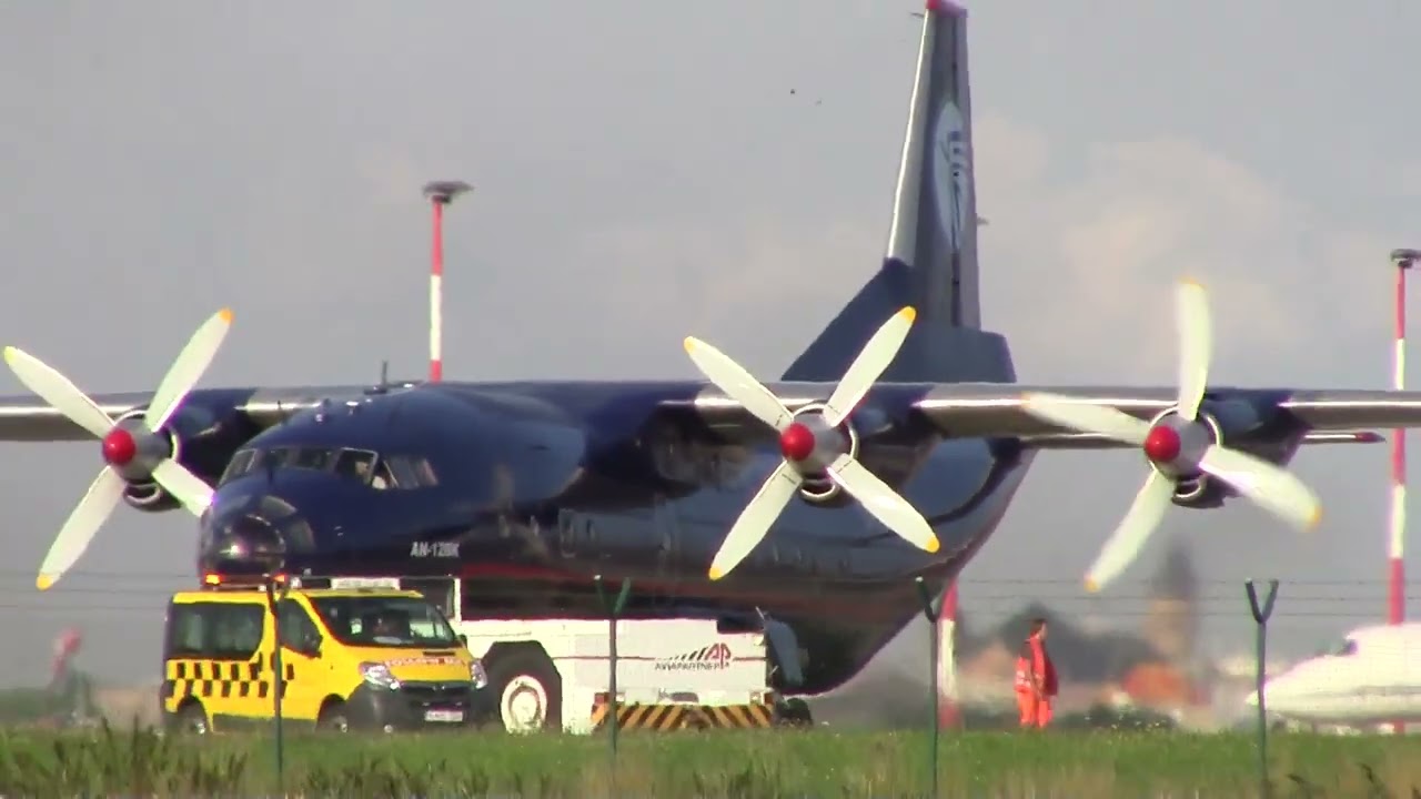 IN A HURRY : MERIDIAN Antonov 12 UR-CGV  departure Ostend Airport