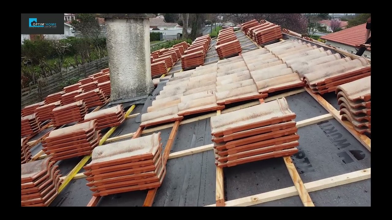 Rénovation globale : couverture, isolation, façade et panneaux photovoltaïques
