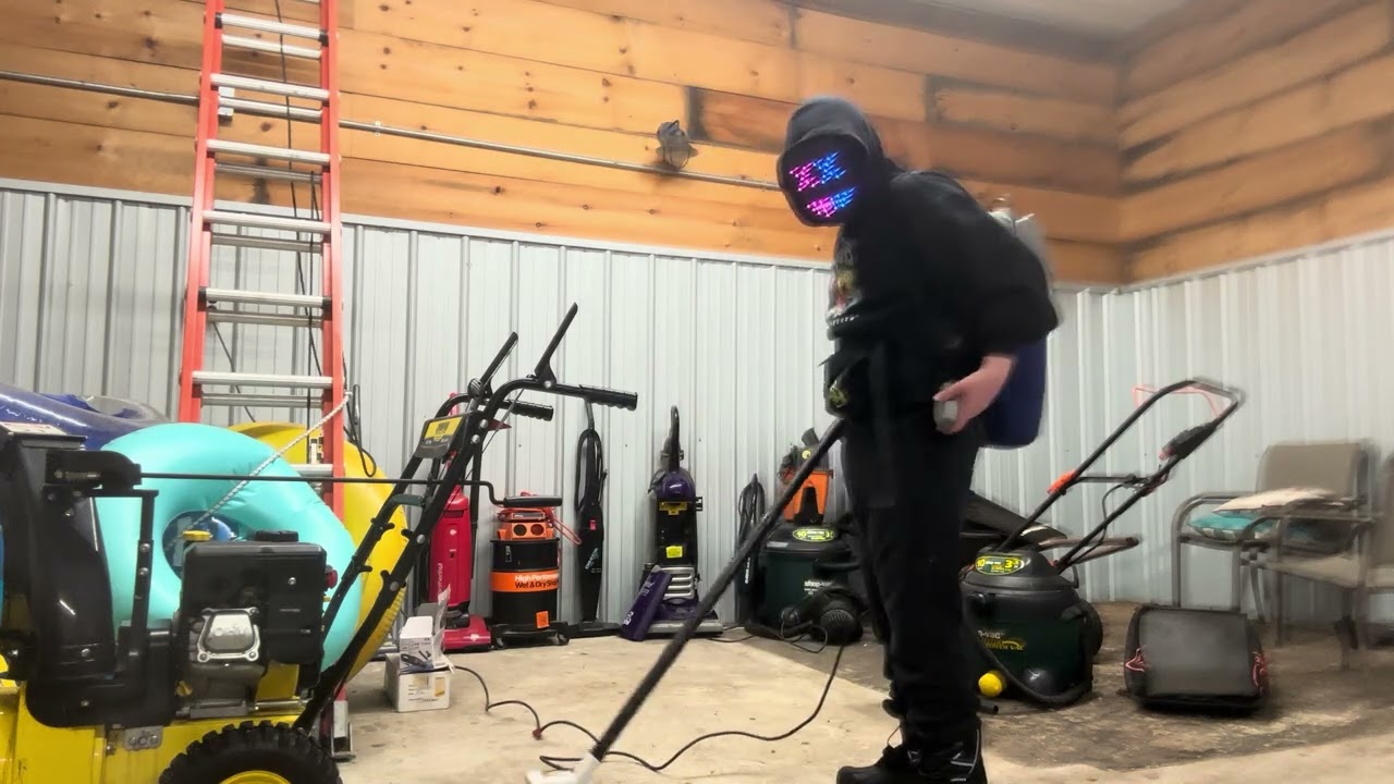 Vacuuming with shop pac backpack vacuum 
