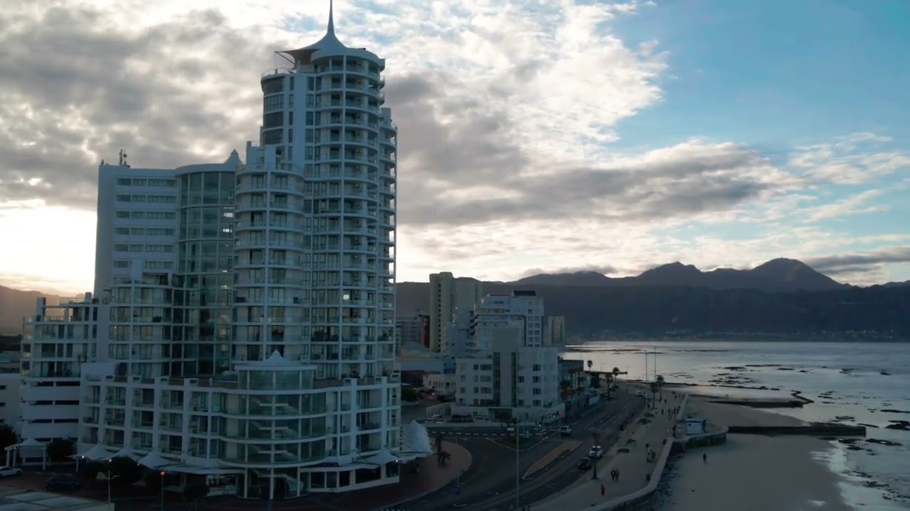 4K Free Stock Footage &ndash; Dramatic Coastal Cityscape at Sunset | No Copyright Cinematic Video