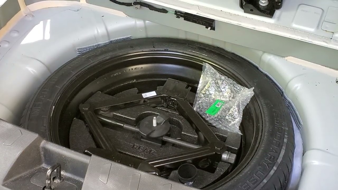How to access get to remove spare tire on 2020 Chevrolet Traverse SUV Wagon