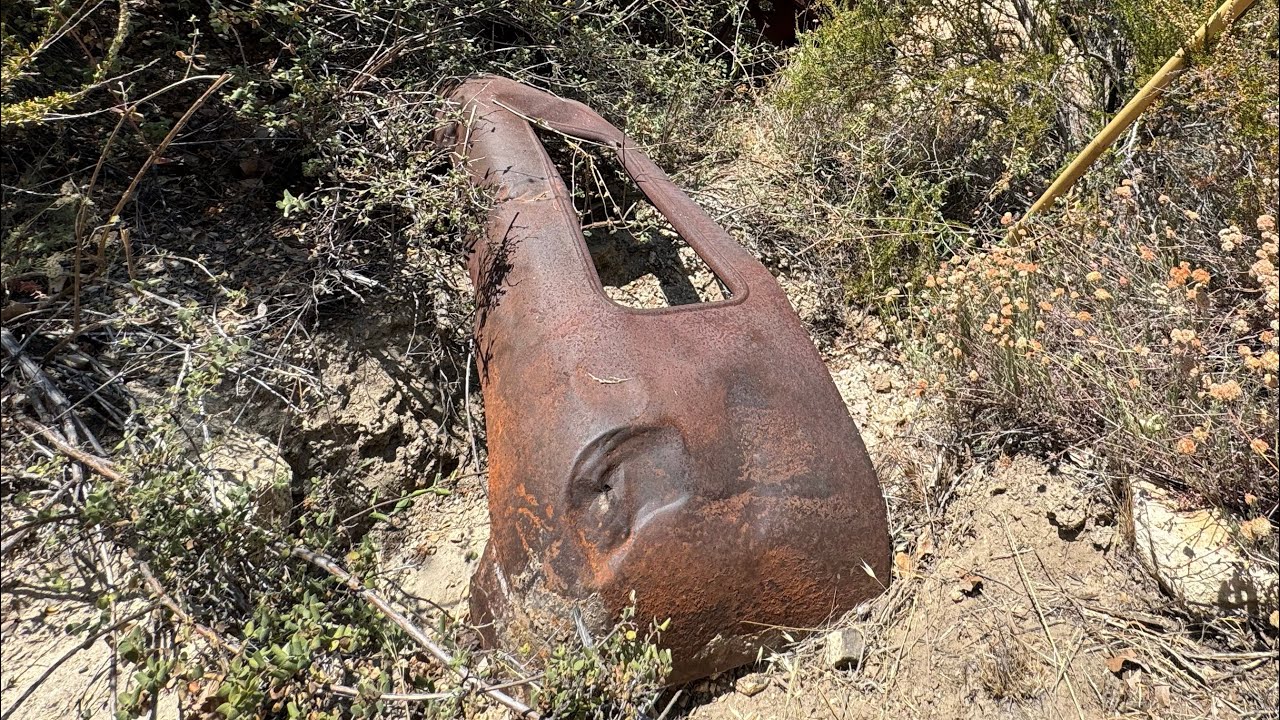 1930s AUTOMOBILE FOUND OFF CALIFORNIA MOUNTAIN.