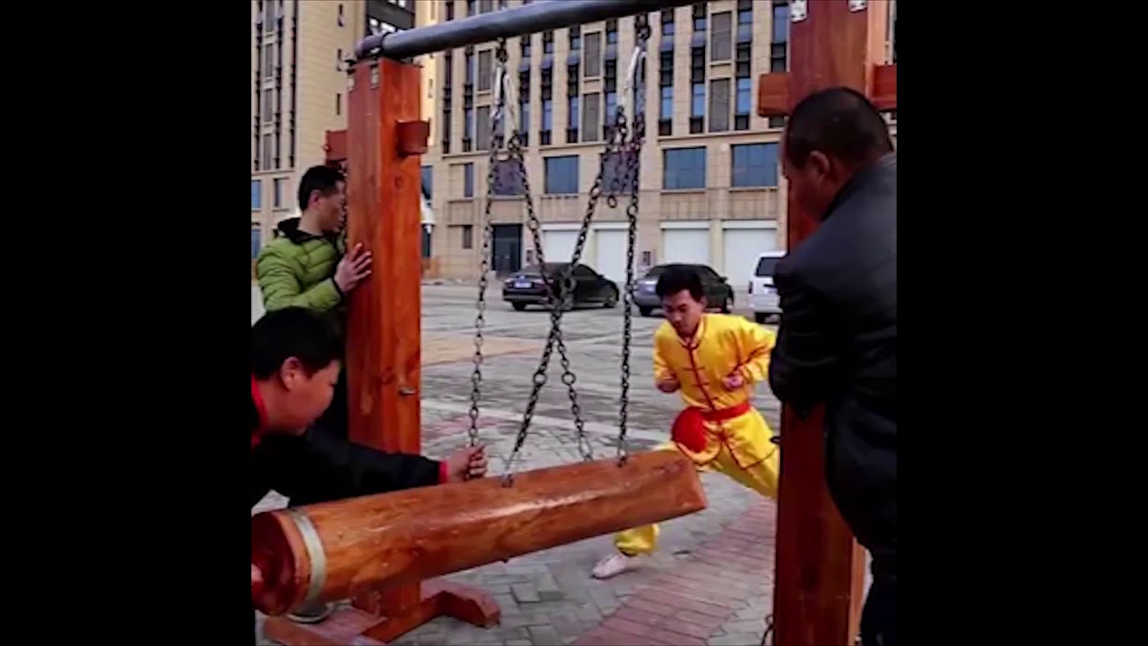 shaolin monks getting hit in the balls but i put wii music over it