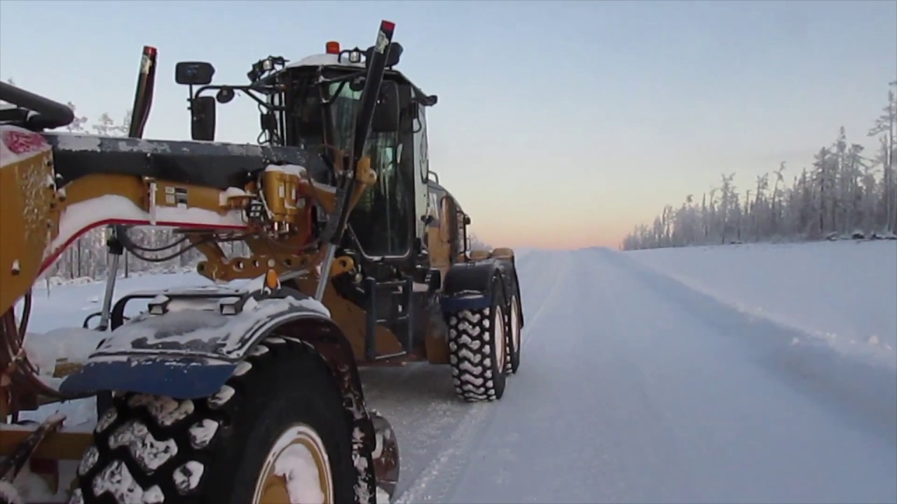 Snow Removal- Cat 140M AWD Motor Grader  skilled operator